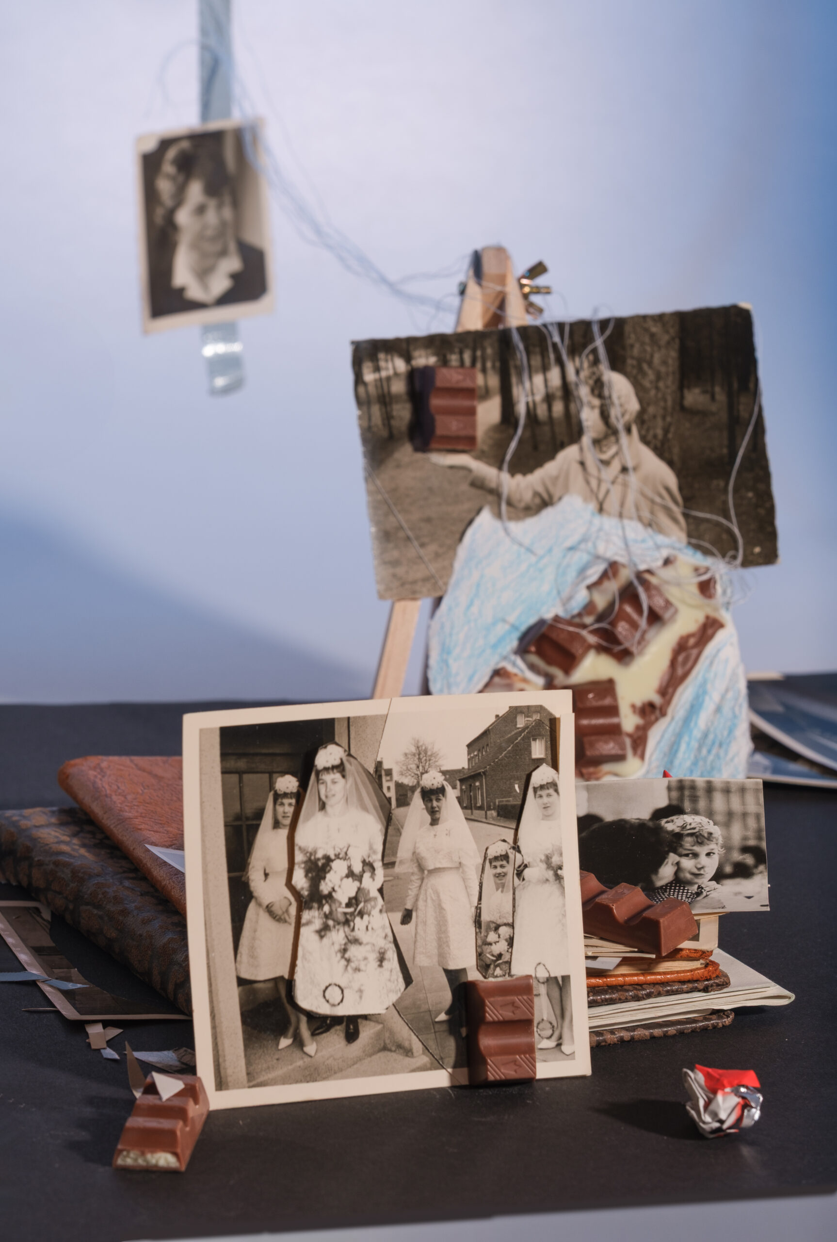 Mutter - Part II Metaphorische Collage aus alten Fotos einer Frau, Familienstammbüchern und Kinderschokolade